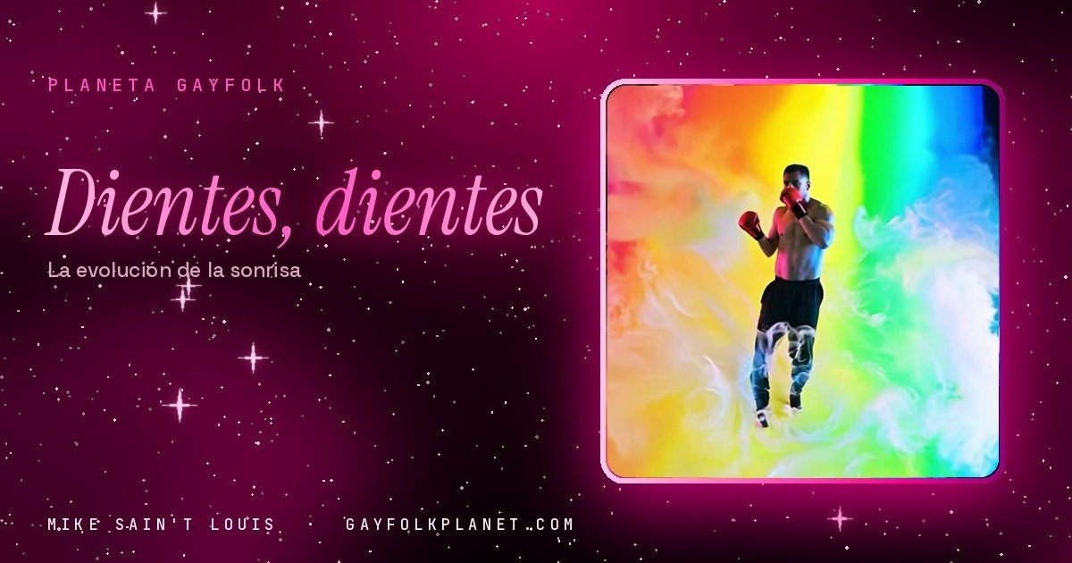 Fotograma del videoclip de «Dientes, dientes»: un hombre con guantes de boxeo avanza entre una nube de humo con los colores del arcoíris